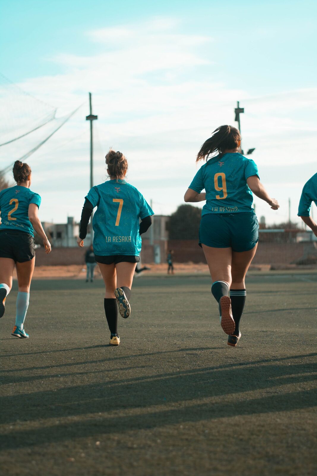 Team femminile in divise personalizzate coordinate